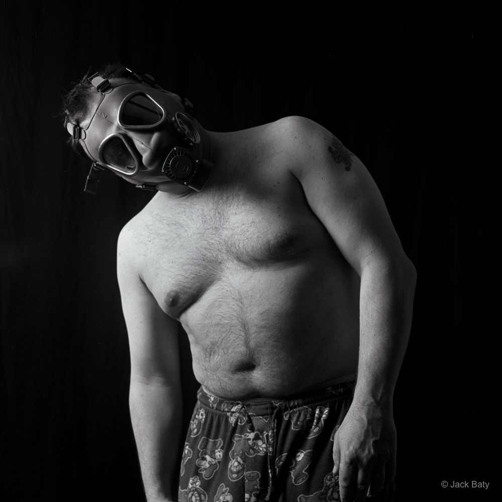 Jack self-portrait with Gas mask (2010). Minolta Autocord. Tri-X.
