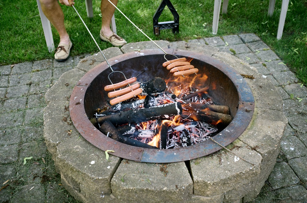 Hot dogs over firepit